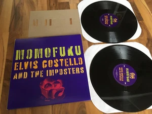 ELVIS COSTELLO AND THE IMPOSTERS MOMOFUKU 2 LPS ORIGINAL VINYL VG+ - Imagen 1 de 3