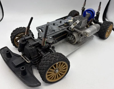 For parts Tamiya TG10 chassis with engine and servomotors - Image 1 of 4