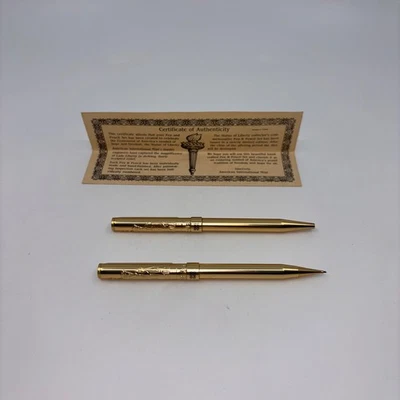 Juego de bolígrafos y lápices Estatua de la Libertad tono dorado con certificado de autenticidad American Int’l Mint Foto 1 de 2