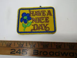 OLD HAVE A NICE DAY FLOWER SEWING PATCH ADVERTISING CRAFT - Picture 1 of 2