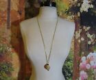 Gold Tone Chain Necklace with an Asian Wood Bead with Flowers & Writing 30"