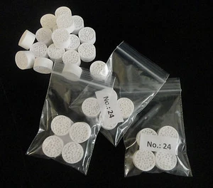 MENGE ACHT (8) KLEINE VERNETZTE ALUMINIUMOXID GESCHMOLZENES METALL FILTERSETTER Nr.: 24 - Bild 1 von 8
