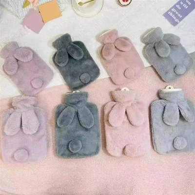 10/Lindo biberón de agua caliente de dibujos animados de felpa cola de conejo relleno de agua calentador suave para bebés Foto 1 de 4