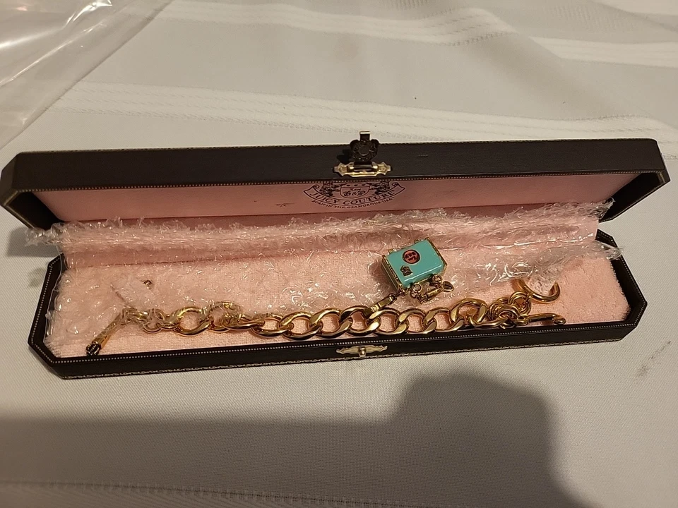 Pulsera Juicy Couture Oro Dije Vintage 1 Dije Viajeros del Mundo con Caja Original Foto 1 de 4