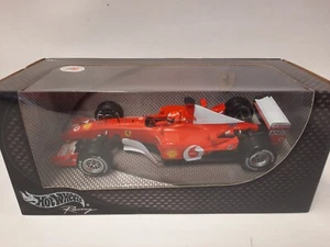 Hot Wheels Ferrari F2002 #1 Michael Schumacher World Champion 2002 1/24 55488 - Foto 1 di 3