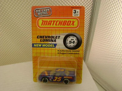 1990 MATCHBOX SUPERFAST MB54 BLUE CHEVROLET LUMINA STOCK CAR NEW ON CARD - Image 1 of 3