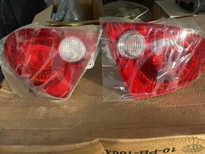 (OA) 22751401 & 22751402 GM Taillight Set Left & Right Chevrolet Cobalt - Picture 1 of 6