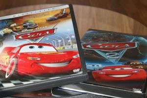 Disney Cars AND Cars 2 DVDs Lot Pixar Extras Bonus Features Cases TWO Movies EUC - Bild 1 von 4