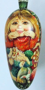 Exclusive Russian Christmas Ornament Hand Painted Tear Drop Shape Girl1 w/ Toys - Picture 1 of 3