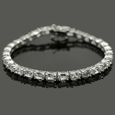 Brazalete de tenis de plata de ley 925 con piedras preciosas de topacio blanco natural ovalado de 6x4 mm  Foto 1 de 4