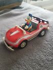 Vintage Disney Donald Duck Tin Metal pull back friction red race car toy 