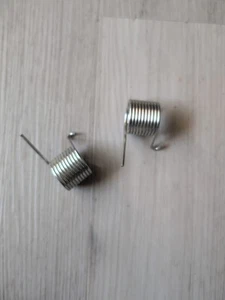(2) Original TORO Drehfeder links & rechts 21462 21464 21466 21467 139-5478 - Bild 1 von 1