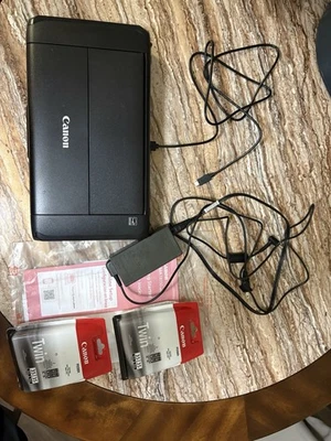 Canon Pixma TR150 with Cords, 3x Twin Ink Packs, Adapter, Instructions, Setup CD - Image 1 of 4