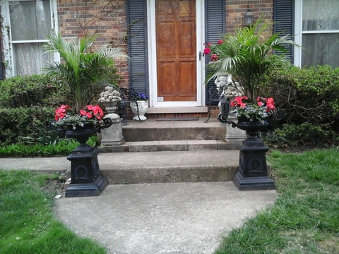 pair of vintage LARGE urns with plinths Cover