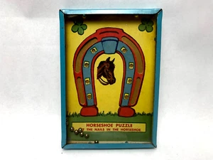 Juego Puzzle Herradura Infantil Vintage. 3-1/2" x 5" en caja metálica. - Imagen 1 de 3