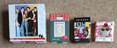 NEW Friends BUNDLE, 500 piece Jigsaw, Trivia Game, Lobster Socks, Hand Warmers - Image 1 of 4
