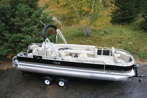 New 24  two tube pontoon boat with 115 hp and trailer