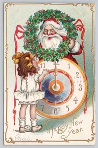 Reloj de Papá Noel Feliz Año Nuevo en relieve postal dividida en relieve - Imagen 1 de 2