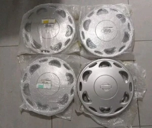 NISSAN GENUINE PRIMERA 14" INCH WHEEL HUB CAP COVER 403157C300 X4 NEW OLD STOCK - Picture 1 of 7