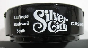 Las Vegas Silver City Pájaro Plata Pepita Plateado Cenicero Vidrio Negro De Colección - Imagen 1 de 6