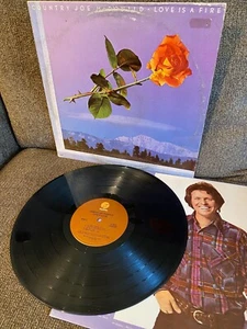 COUNTRY JOE McDONALD Love Is A Fire 1976 Fantasy LP F-9511EXC- w/lyric sleeve - Picture 1 of 1