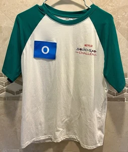 Netflix Squid Game The Challenge TV Show Promo Merch - Spieler T-Shirt Größe Medium - Bild 1 von 2