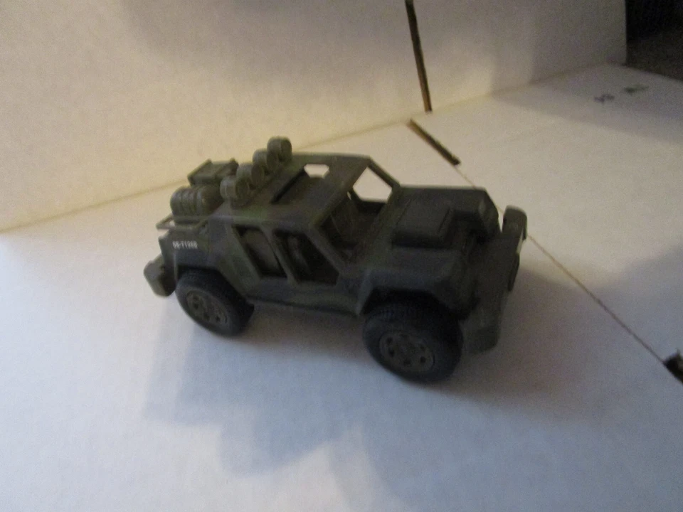 New-Ray brand military jeep (camo) toy   - Image 1 of 1