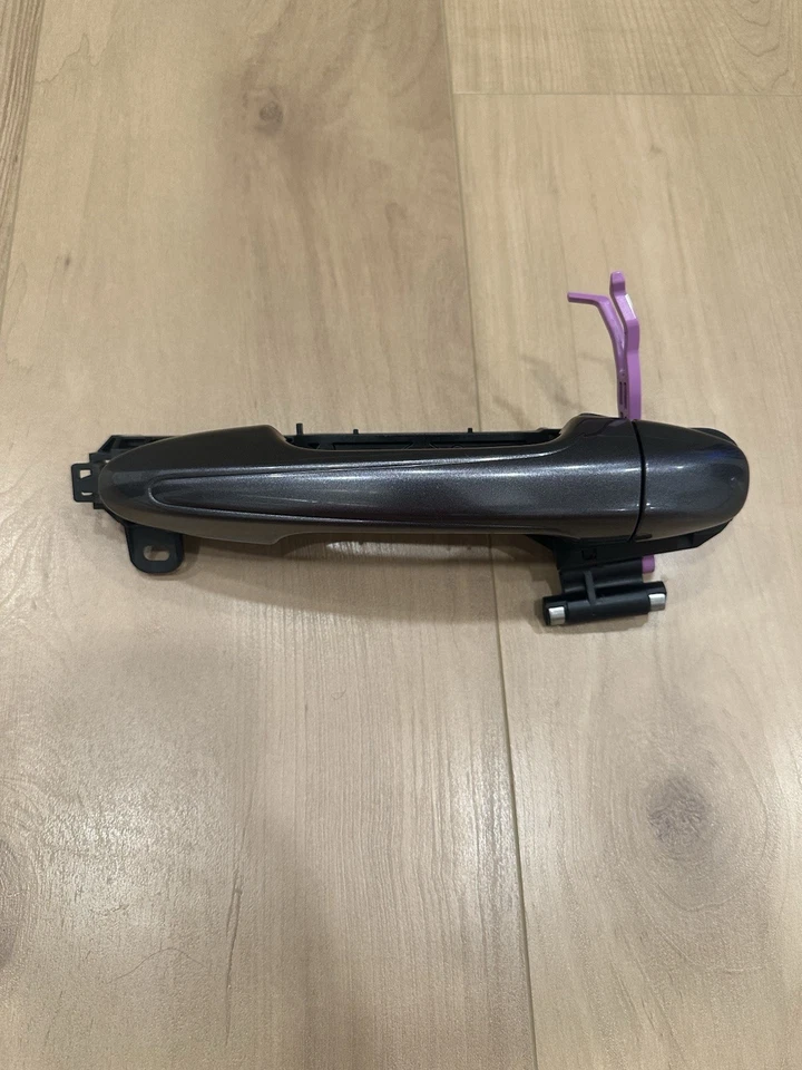 Manija de puerta derecha exterior + marco OEM genuino Toyota Rav4 [69211-0R020] (2013-2016) Foto 1 de 4