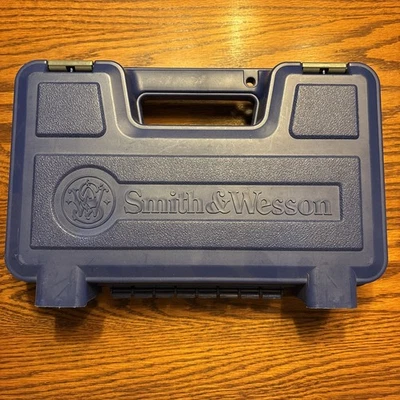 Smith and Wesson M&P 40 Blue Hard Plastic Case With Lock, Straps And Manual - Image 1 of 4