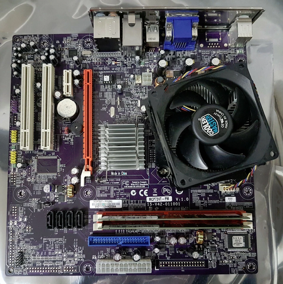 ECS MCP73VT-PM LGA775 MicroATX Motherboard with Core 2 E5300 4GB RAM Backplate - Image 1 of 4