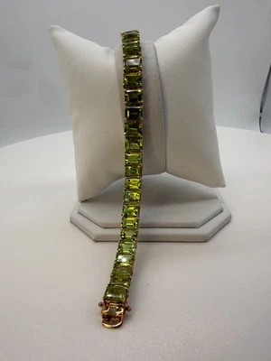 Elegant Green Peridot Tennis Bracelet Emerald Cut Gemstones 18K Gold over Silver - Image 1 of 4
