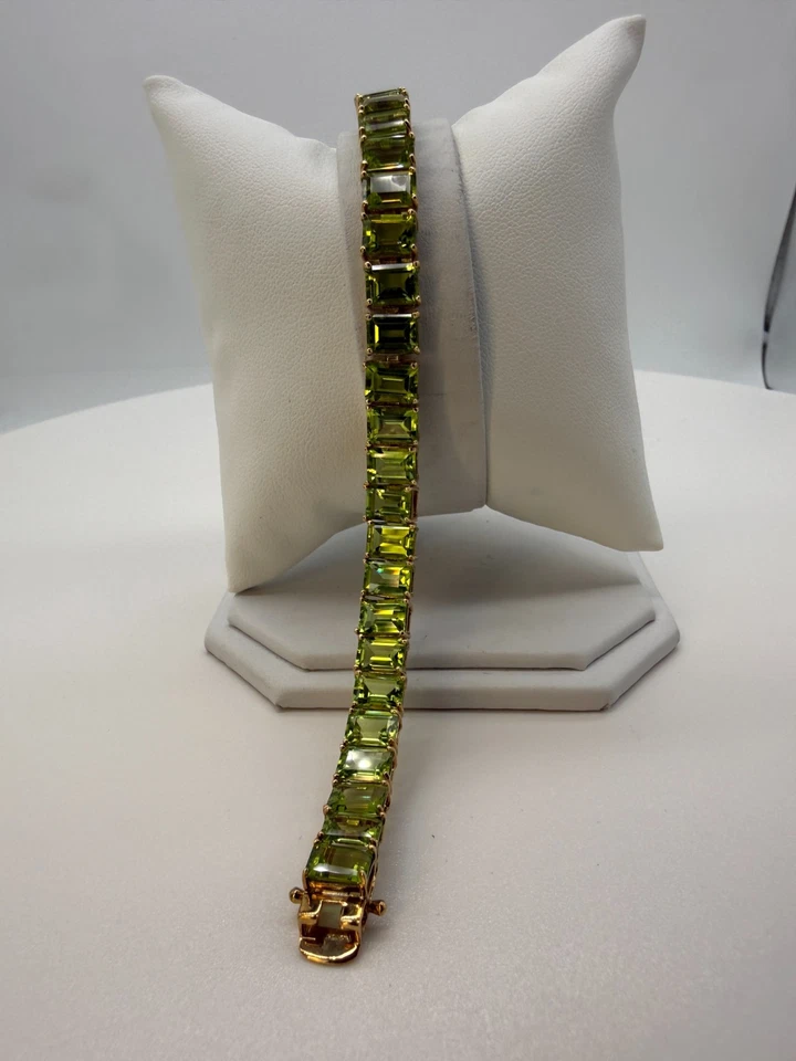 Elegant Green Peridot Tennis Bracelet Emerald Cut Gemstones 18K Gold over Silver - Image 1 of 4