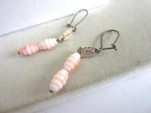 Vintage gold tone pierced earrings with carved angel skin coral bead drops - Picture 1 of 3