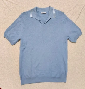 Polo de golf Zara tejido para hombre medio azul con bandas inferior texturizado manga corta - Imagen 1 de 8