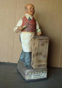1969 BARTENDER, LIONSTONE Whiskey Decanter, Porcelain, 12" (empty) - Picture 1 of 6
