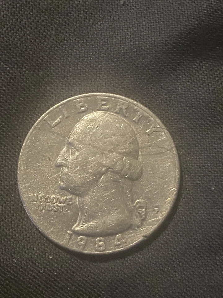 Cuarto de época 1984 lleno en marca de ceca P y falta F of and the A en América. Foto 1 de 2