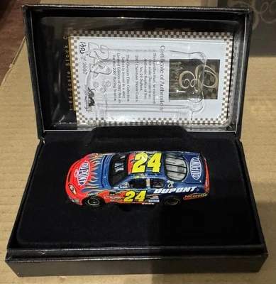 2007 Jeff Gordon Dupont Standard Paint 1:64 scale ELITE car - Image 1 of 4