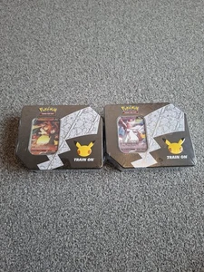2x Pokemon Celebrations 25th Anniversary Lances Charizard V & Dark Sylveon Tins - Bild 1 von 5