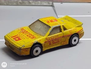 Matchbox - Pontiac Fiero - 1:56 - 1985 - gelb / gold - Laser Wheels - Bild 1 von 5