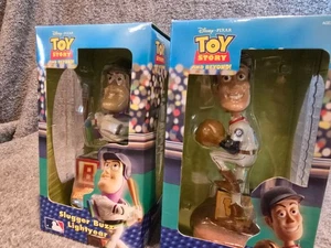 Slugger Buzz Lightyear & Strikeout Woody Bobbleheads MLB Mariners ¡Muy raro nuevo en caja! - Imagen 1 de 9
