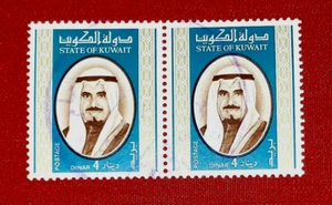 {STATE OF KUWAIT/ SCOTT #763/ USED PAIR/ VF/ CV $100.00/epictronic/JC} - Bild 1 von 2