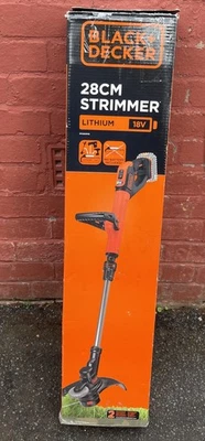 Black and Decker STC1820PC 18v Cordless Telescopic Grass Trimmer and Edger 28cm - Image 1 of 4