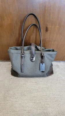 Bolso de mano Tumi, carbón/marrón. Foto 1 de 4