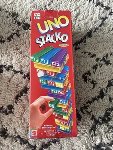 UNO Stacko Partyspiel farbige Stapelblöcke Balance Mattel sehr guter Zustand Familienspiel - Bild 1 von 3
