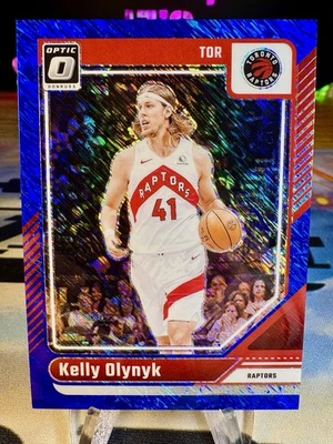 2024-25 Kelly Olynyk Panini Donruss Optic Blue Shimmer /75 #152 Raptors - Image 1 of 2