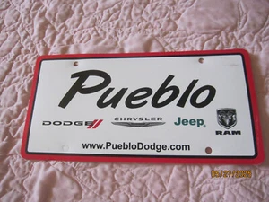 Plastic Dealer Advertising for Dodge license plate from Pueblo, Colorado - Picture 1 of 7