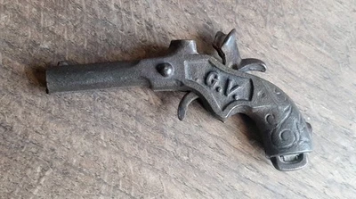 Jouet ancien pistolet en fonte - Photo 1/4