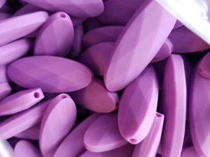50 cuentas de silicona a granel geométricas de grado alimenticio y sin BPA lavanda púrpura - Imagen 1 de 1
