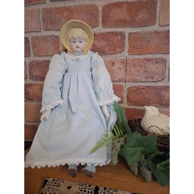 Muñeca con cuerpo de tela de porcelana estilo colonial vestido azul de colección, muñeca coleccionista Foto 1 de 4