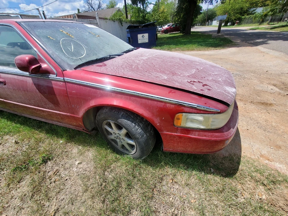 Cadillac Sevilla 1999 2000 2001 2002 2003 2004 guardabarros pasajero derecho rojo Foto 1 de 1
